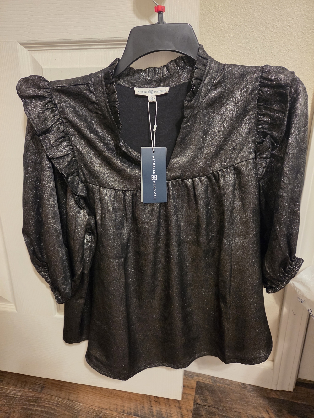 Metallic Black Ruffle-Shoulder Blouse by Michelle McDowell